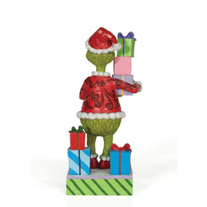 The Grinch Holding Presents